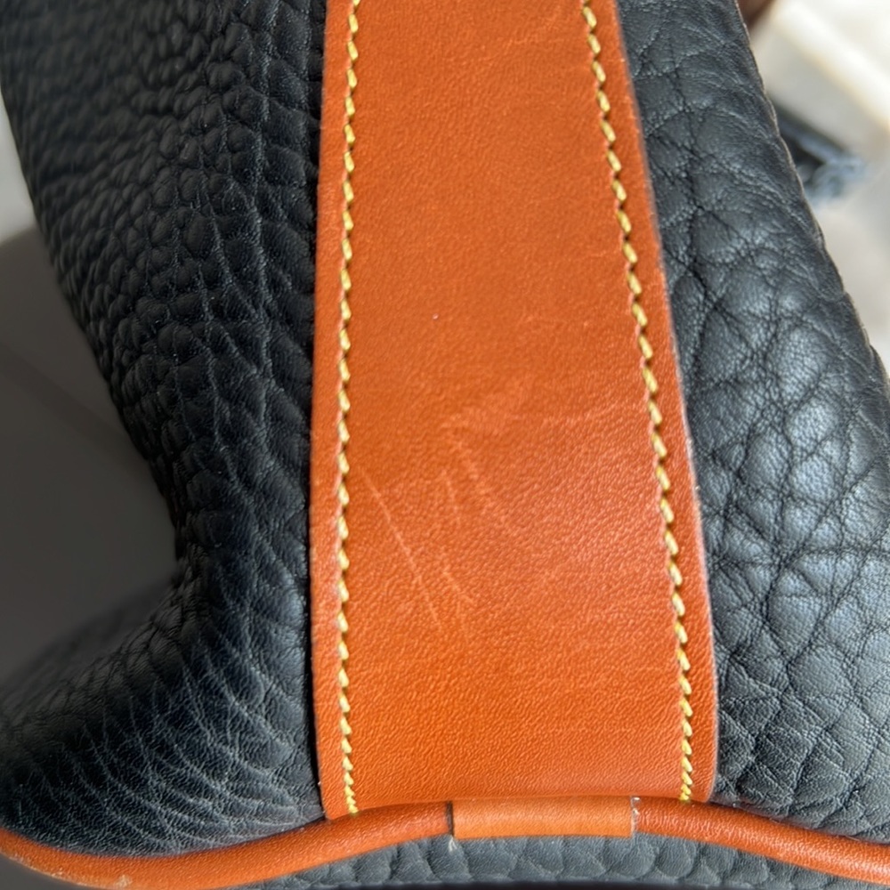 Vintage Dooney and Bourke Pebbled Leather Bucket Bag with brass accents - Picture 14 of 16